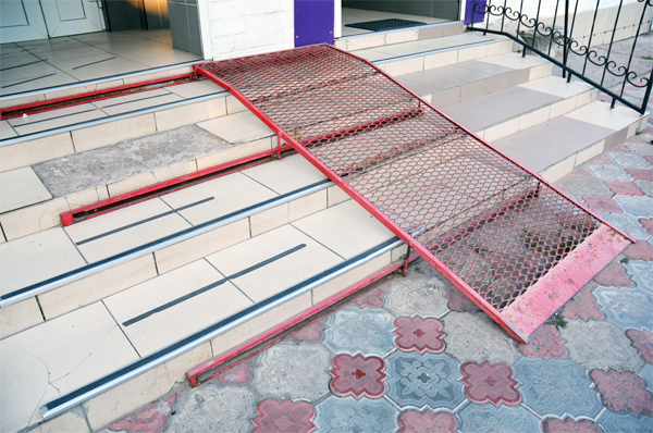 Example of Accessibility Bolt-On - Metal Ramp - Stone Building